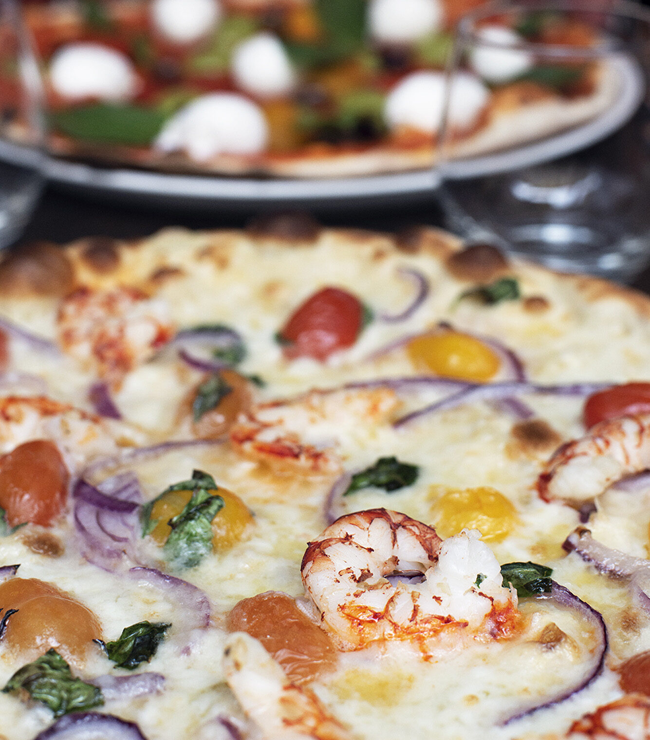 Freshly prepared pizza.