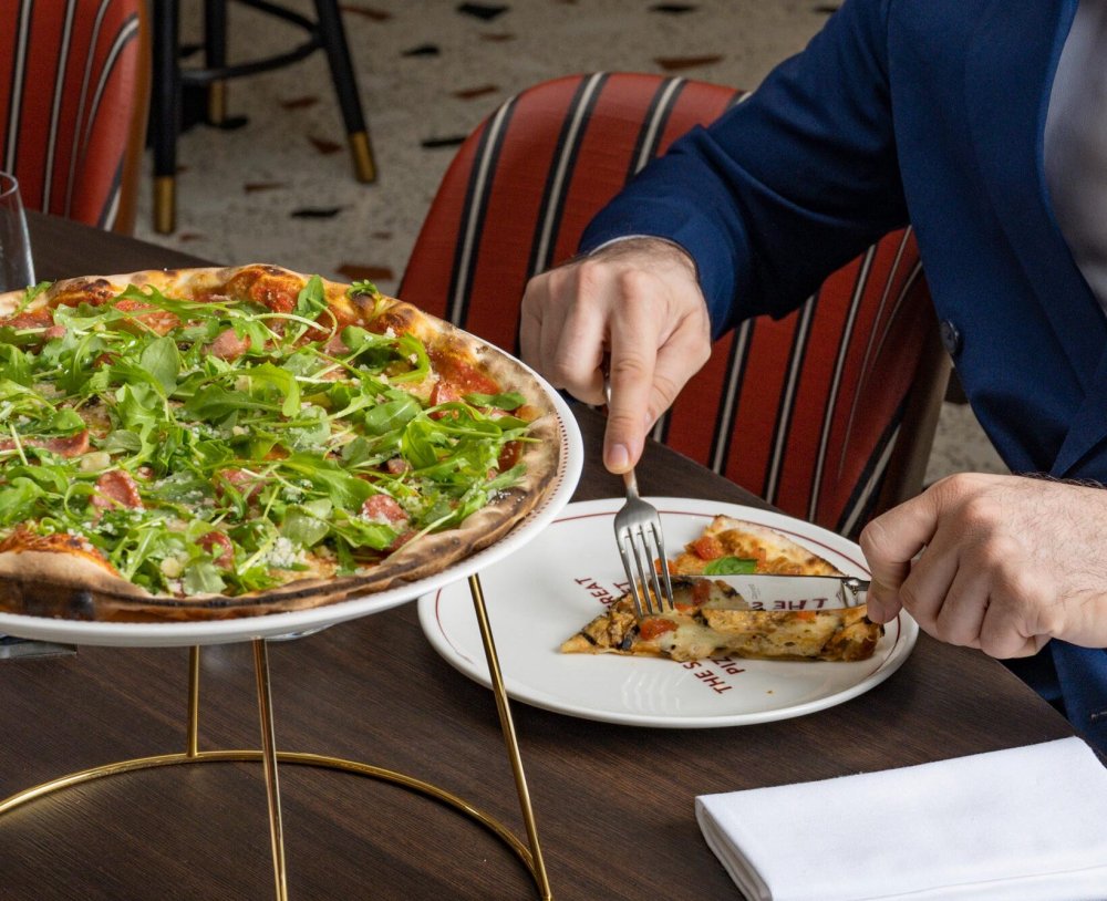 Freshly served pizzas.