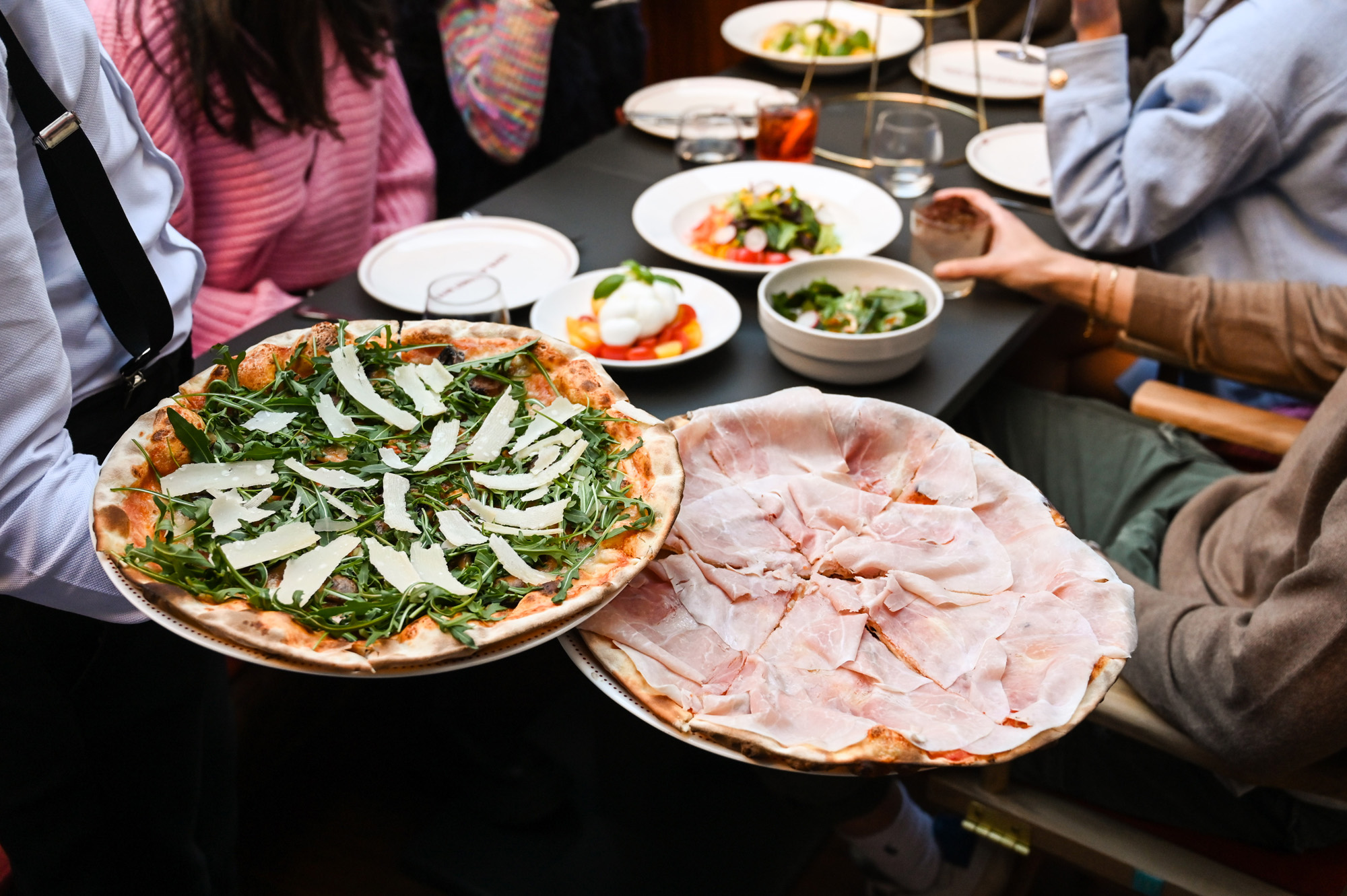 Freshly served pizzas.